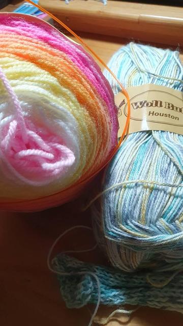 Bright colors pink white yellow orange fuchsia sky blue yellow skeins ready to be used
