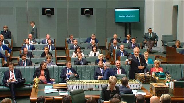 Australian PM Morrison thrusting a lump of coal in the Australian Parliament in 2017 and saying "This is coal, don't be afraid."