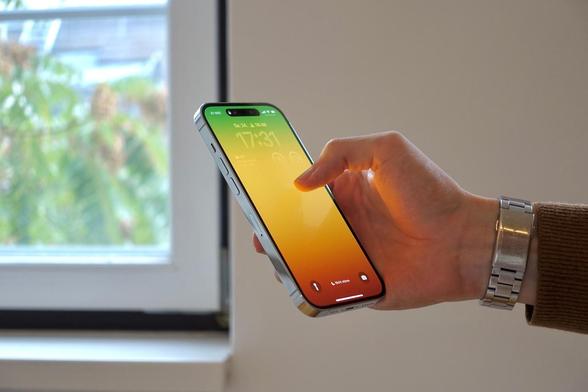a man holding cell phone