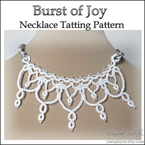 A handmade lace necklace in tatting with a double pointed design, shown in white thread and clear beads on a small mannequin. The lace would show at the front of a neckline only and is finished on each side with ribbon to tie around the neck.