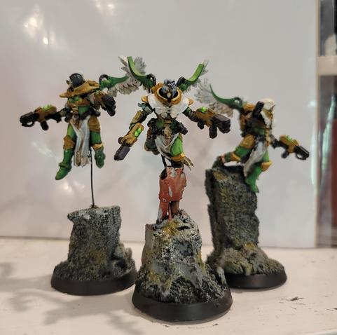 Three flying battle sisters with flamers.