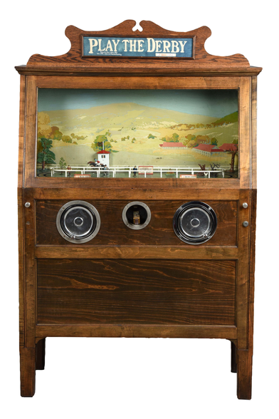 Cabinet of the Chester-Pollard Amusement Co game International Derby, featuring a crank wheel to send horses racing around a defined track.

https://auctions.morphyauctions.com/5__chester_pollard_play_the_derby_horse_racing_arc-lot281105.aspx