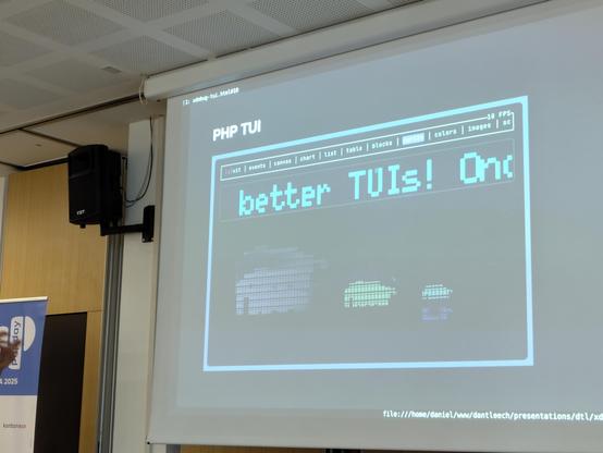 Slide with a TUI (Terminal User Interface) showing #PHP elephpants
