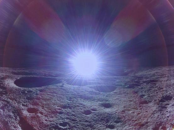 The Sun rises over the horizon of the Moon in this photograph taken from the cratered lunar surface. The bright Sun is overexposed with diffraction spikes and lens flares.