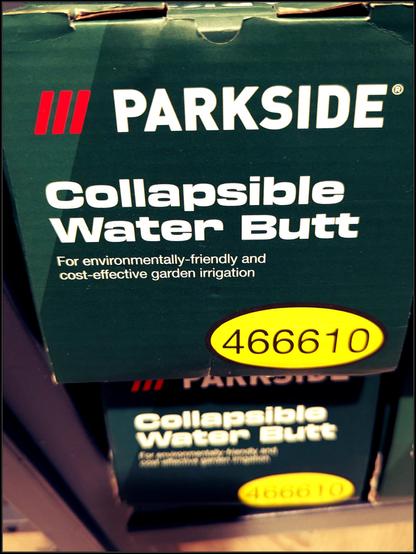 A stack of boxes with the text 

"Parkside

Collapsible Water Butt

For environmentally-friendly and cost-effective garden irrigation."