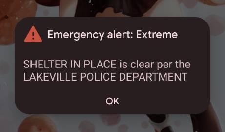 Mobile screenshot with red alert icon that says: "Emergency alert: Extreme - SHELTER IN PLACE is clear per the LAKEVILLE POLICE DEPARTMENT"