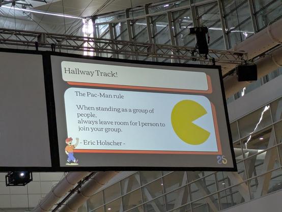 Hallway Track! 

The Pac-Man rule

When standing in a group of people, always leave room for 1 person to join your group.