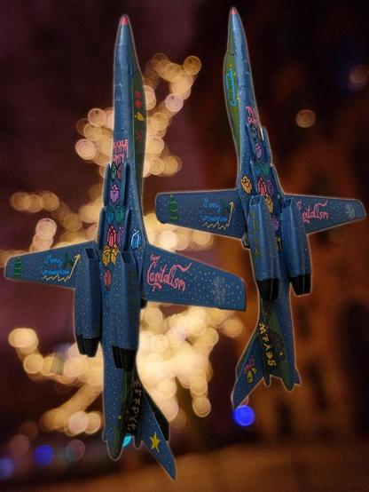 Soviet Bomber Airplane with Christmas and Capitalism/Consummerism critical Paintings: "Merry Consummerism", "Enjoy Capitalism". Ready to bomb the World with useless gifts.