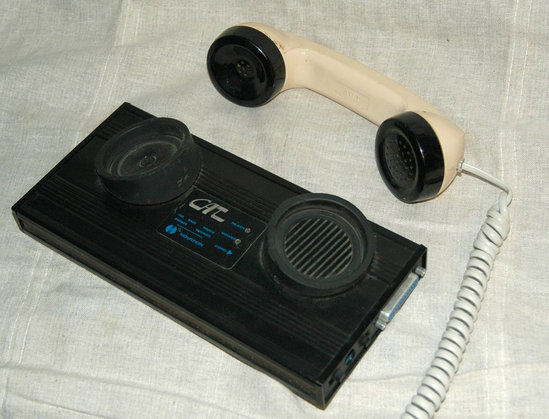 The picture of an old modem with the phone off the hook.