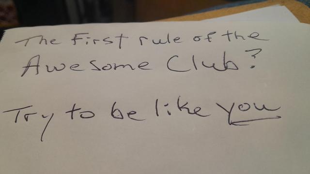 Handwritten message that says the first rule of the awesome club? Try to be like you.