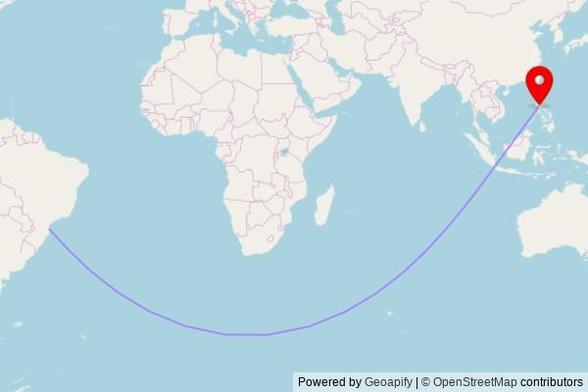 A map showing the great circle route from São João do Itaperiú in Brazil to a map pin at Wesleyan Church, Segment 28, Valenzuela, 1442 Metro Manila, Philippines