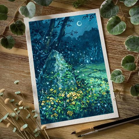 A photo of a portrait-format painting placed on a wooden table and surrounded by paint brushes, dried flowers, and leaves for decoration. The painting features a pointy standing stone surrounded by dense yellow flower clusters, a thin pathway leading towards a softly glowing treeline through a grassy meadow. Tiny glowing fairies flit from the stone to the treeline. A sickle moon hovers above in the nightsky.