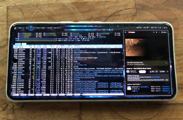 i3, picom, polybar, firefox, and htop running on Linux on Android (Pixel pro 8 phone) 