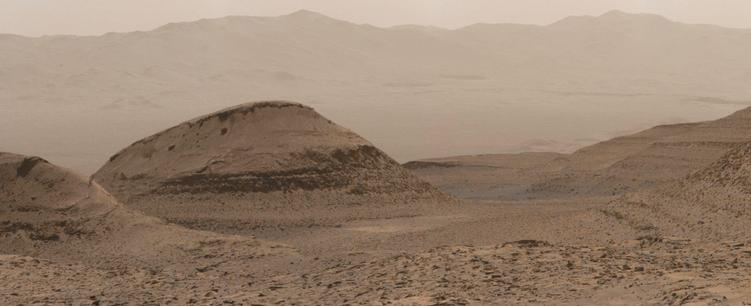 An ochre toned image capturing a Martian landscape.