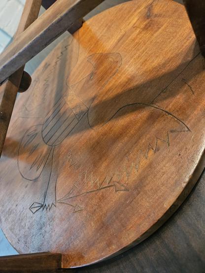 A US war eagle that is etched into the bottom of the table.