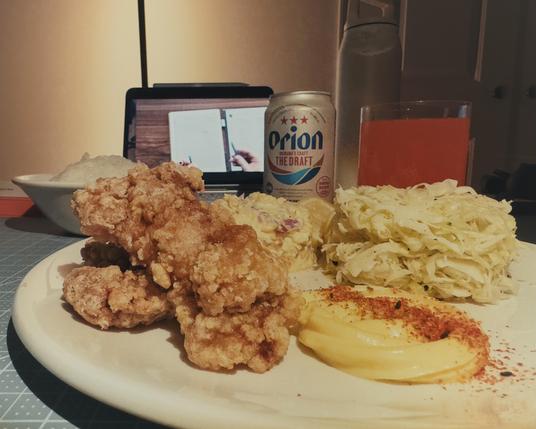 Karaage (Japanese fried chicken) with shredded cabbage, potato salad, mayo, and rice. Marco’s e-ink  tablet video is shown on my iPad.