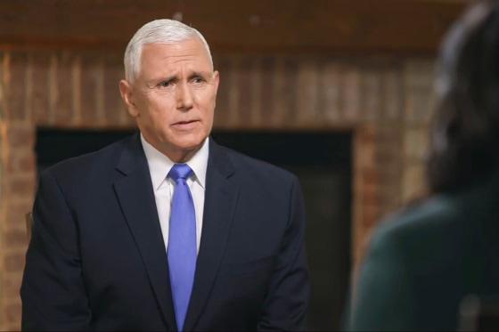 Mike Pence being interviewed on the Meet the Press by Kristin Welker, seen over her shoulder.