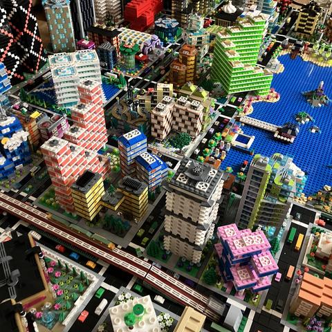 Some high rise buildings surrounding Micropolis Bay, where the elevated rail line temporarily dives into a tunnel
