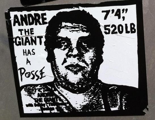 The classic Shepard Fairey Andre the Giant sticker image, spotted in the wild. It has a black & white image of Andre’s head & shoulders, with the words “Andre the Giant has a Posse” on the left and “7’4”, 520lb” on the right. 