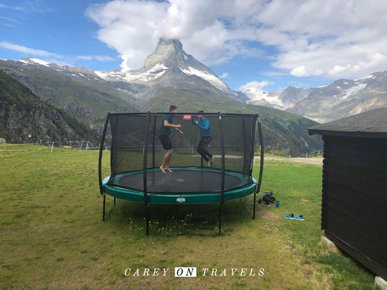 Jumping on a trampoline in front of the Matterhorn
