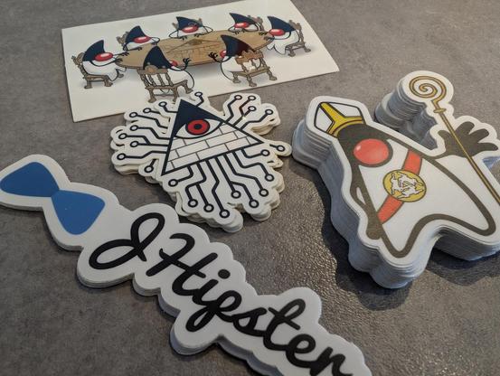 4 different stacks of java related stickers in a table