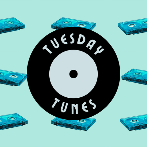 A vinyl record in the center with the text: "TUESDAY TUNES" printed on it, centered on a field of cassette tapes in a light blue-green color. 