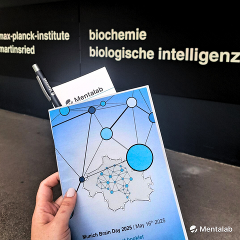 Munich Brain Day Brochure in front of the Max Planck building