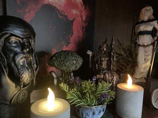 Pagan altar with Odin, Frigg and Freya statuettes 