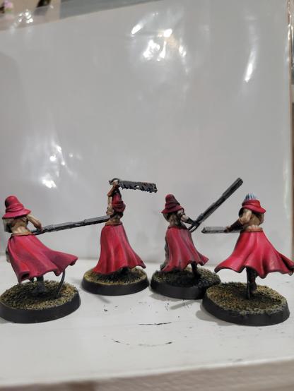 The backs of four Repentia