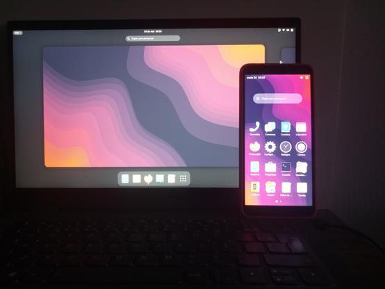 A laptop and a smartphone running GNOME shell.