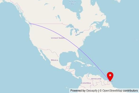 A map showing the great circle route from Port Alberni in Canada to a map pin at Église Saint-Antoine, 360 Chemin Saint-Antoine, 97300 Cayenne, France
