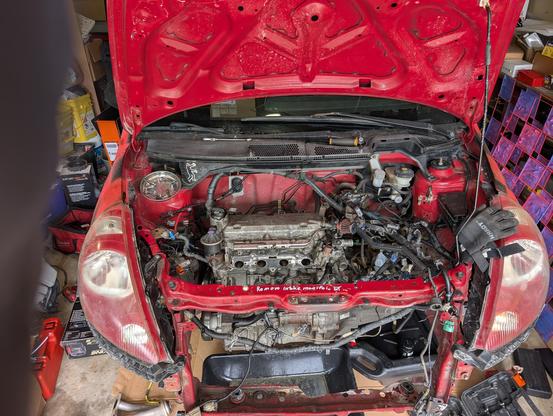 Honda fit in bits that are not fitting together lmao gottem