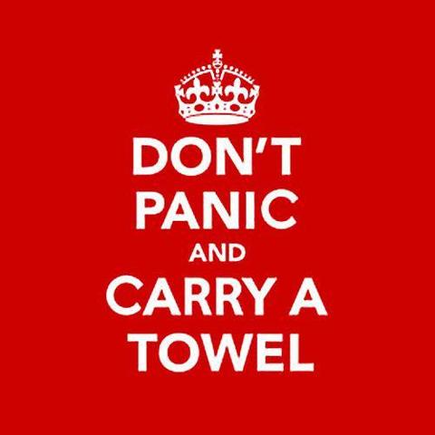 "DON'T PANIC AND CARRY A TOWEL"