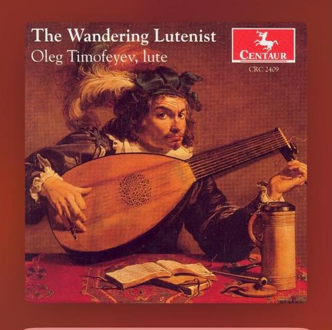 Album cover titled "The Wandering Lutenist" featuring a man playing a lute. The background shows a draped cloth and a book on a table, along with a mug and a small object. The artist's name, Oleg Timof