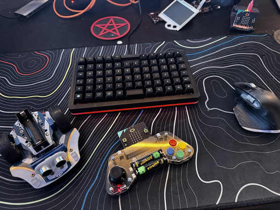 Keyboard surrounded by maker stuff