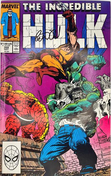 Incredible Hulk #359 (Sep 1989, Peter David – signed) – Jeff Purves cover on a vivid magenta backdrop: Wolverine (brown‑and‑tan costume) dives claws‑first toward the gray Hulk, who wrestles with the green, scale‑skinned Abomination while the Thing charges in below; Peter David’s black‑ink autograph loops across the block‑stone “HULK” logo at the top.