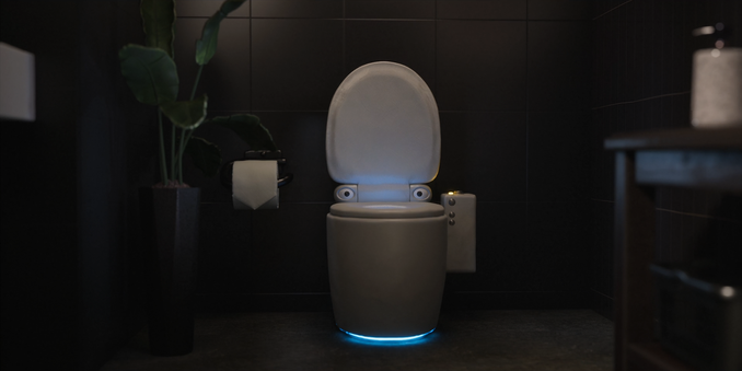 Cena do episódio Smart Appliances, Stupid Owners, da série Love, Death & Robots. Um vaso sanitário inteligente está centralizado na imagem dentro de um banheiro moderno e escuro. O vaso possui dois olhos brilhantes logo abaixo da tampa, reforçando sua natureza consciente e artificial. Sua base emite uma luz azul, e ao lado direito há um painel com botões metálicos, indicando funções automatizadas. À esquerda, há um rolo de papel higiênico preso à parede e uma pequena planta decorativa. A iluminação dramática destaca o vaso como o foco da cena, com uma atmosfera levemente cômica e futurista.