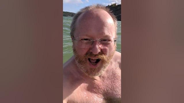 Taking a dip at Hydro beach. Sunny, but 15°C and windy, and 12.5°C in the sea.