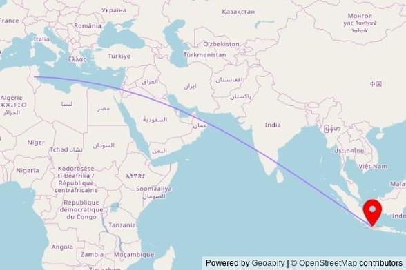 A map showing the great circle route from بوهدمة in Tunisia to a map pin at Masjid Damai Al-Islah, Cisaat, Jelegong 40911, West Java, Indonesia