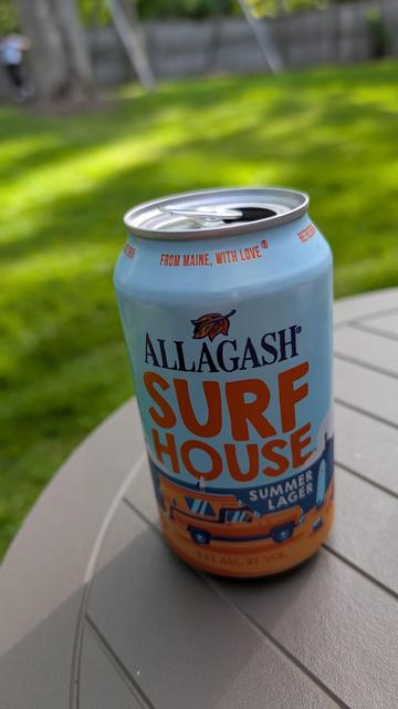 12oz can of Allagash Surf House Summer Lager. Can design is of a beach scene with surfboards and a covered pickup.