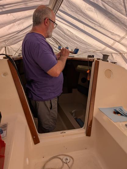 Caulking and attaching the starboard hand rail