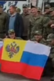 nazi russian soldiers holding the new imperial russian flag with putin as the new tsar of nazi russia.