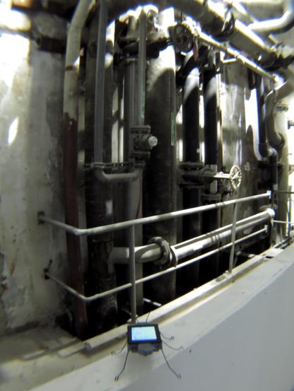 The DigitalBug admires the big piping in the core of one of Komunuma's buildings, a reminder of the industrial past of the place.