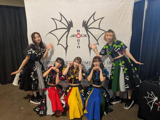 Mameshiba no taigun posing in front of our company banner. 