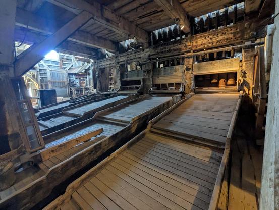 A 20 stamp mill. The tables would have been clad in copper and covered in mercury to extract the gold and silver from the pulverized rock.