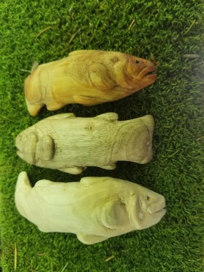 three carved trout, facing the other way