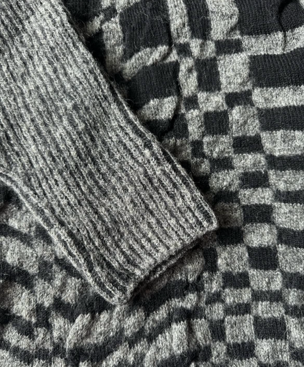 Close up of the ribbed stretchy sleeve of the (mohair) sweater 