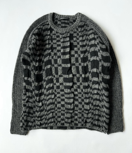 Issey Miyake Mohair Knit Sweater delicate soft mohair knit with a deep gray/ black check pattern the garment's surface has undergone a treatment process to create the textured cableknit-like look you can see on both sides of the piece relaxed fit with raglan sleeves to add to the effect - slightly ribbed stretchy arms  finished with ribbed neckline and simple hem.