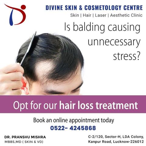 a man is combing his hair and his bald scalp is shown