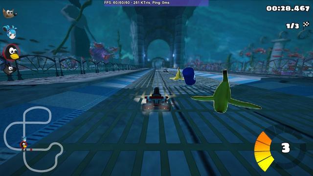 Captura del juego SuperTuxKart en el circuito bajo el agua donde se ve el efecto de los faros